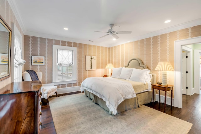 bedroom featuring hardwood / wood-style flooring, ceiling fan, and crown molding