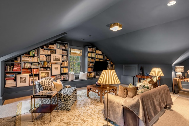 living area featuring light colored carpet and lofted ceiling