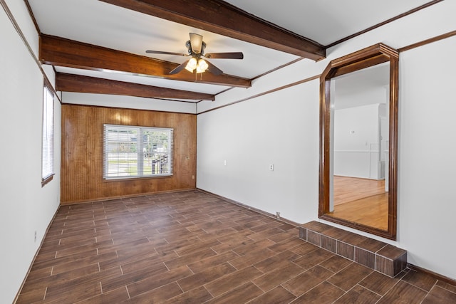 1593 Westwood Dr, Charleston, SC 29412 - spare room featuring wood finished floors, ceiling fan, beamed ceiling, wood walls, and baseboards