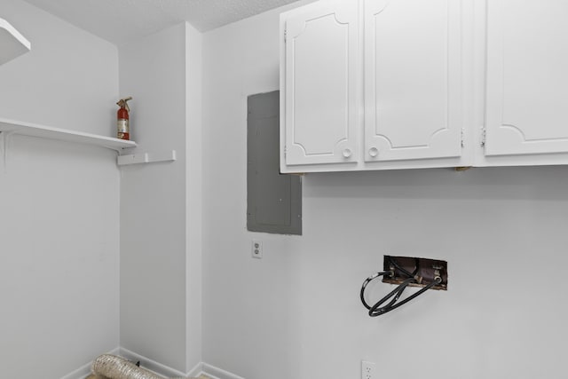 1593 Westwood Dr, Charleston, SC 29412 - washroom featuring electric panel, hookup for a washing machine, baseboards, and a textured ceiling