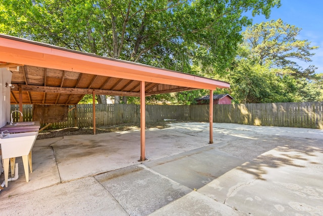 1593 Westwood Dr, Charleston, SC 29412 - view of patio / terrace with a carport and concrete driveway