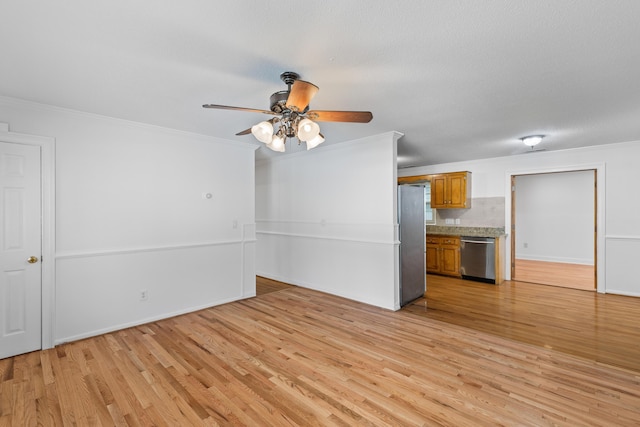 1593 Westwood Dr, Charleston, SC 29412 - unfurnished living room with light wood-style floors, a ceiling fan, ornamental molding, and baseboards