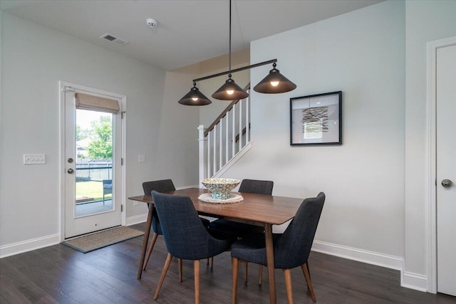 2017 Geranium Ln, Johns Island, SC 29455 - dining space featuring dark wood-style flooring and stairs