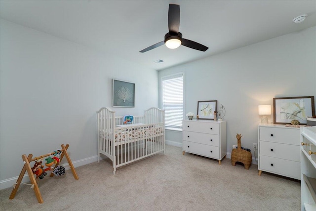 2017 Geranium Ln, Johns Island, SC 29455 - bedroom featuring light colored carpet, a crib, and a ceiling fan