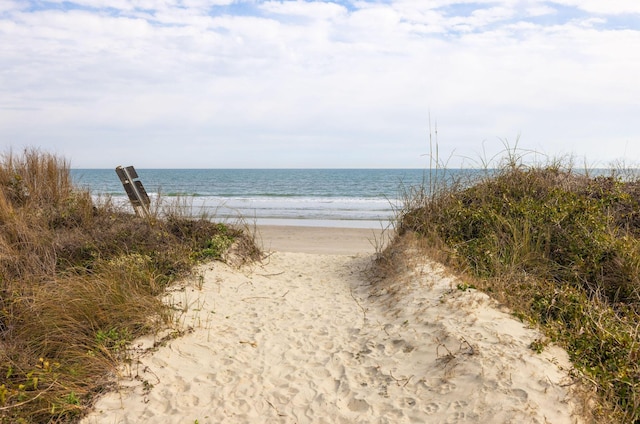 property view of water with a beach view