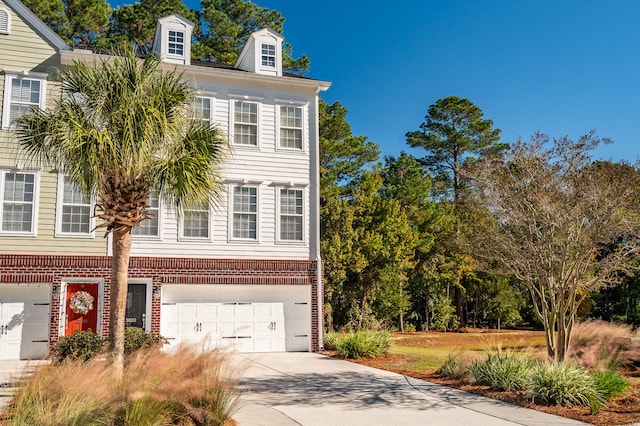 view of front of home with a garage