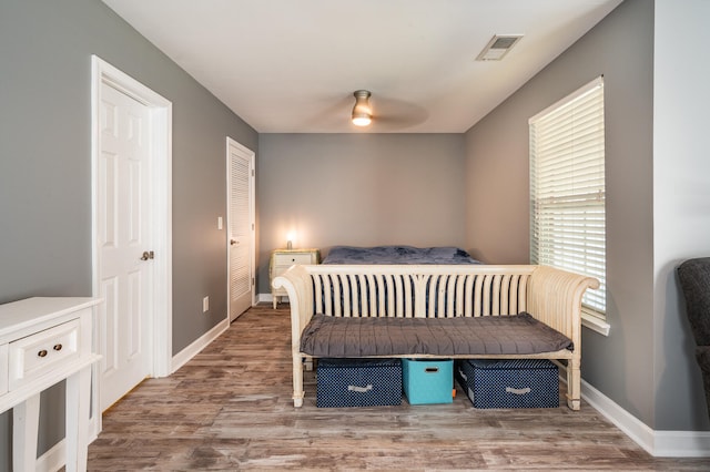 bedroom featuring ceiling fan and hardwood / wood-style flooring