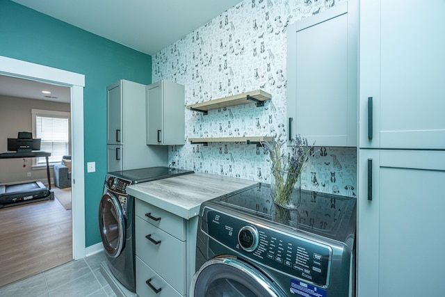2282 Braided Ln, Mount Pleasant, SC 29466 - clothes washing area featuring light tile patterned flooring, baseboards, and cabinet space