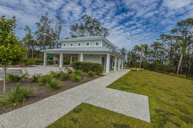 2282 Braided Ln, Mount Pleasant, SC 29466 - view of front of property featuring a front yard, metal roof, and concrete driveway