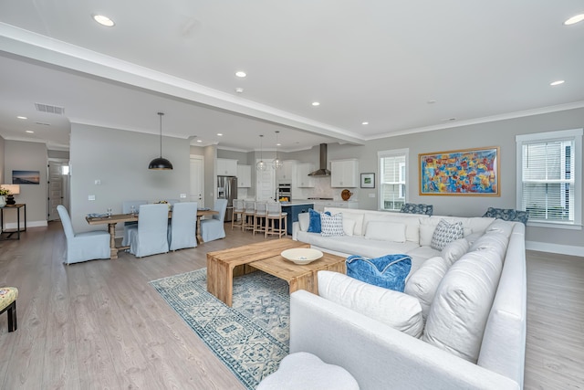 2282 Braided Ln, Mount Pleasant, SC 29466 - living room with visible vents, baseboards, recessed lighting, and light wood-style floors