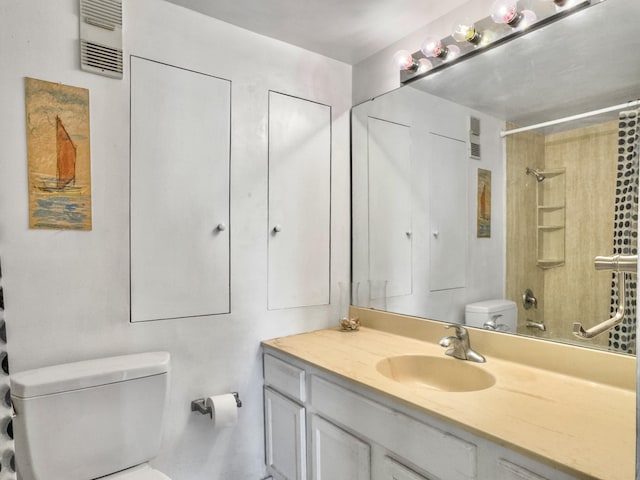 full bath featuring vanity, walk in shower, and toilet