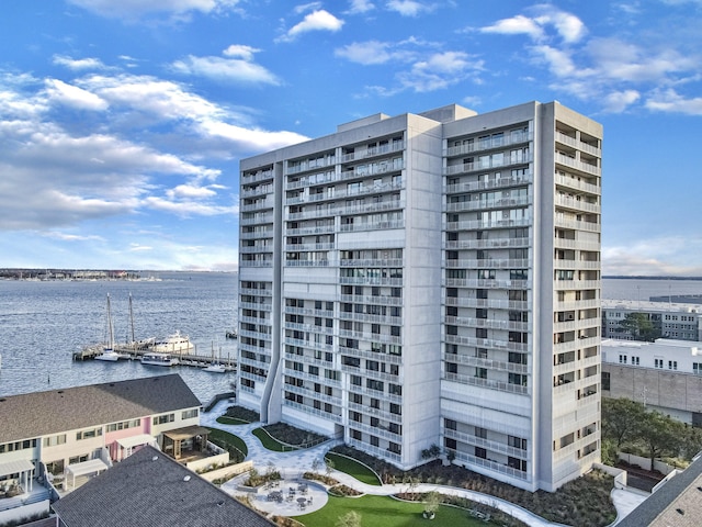 view of building exterior featuring a water view