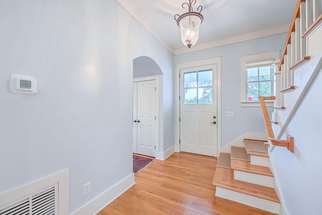 foyer entrance featuring light wood-type flooring