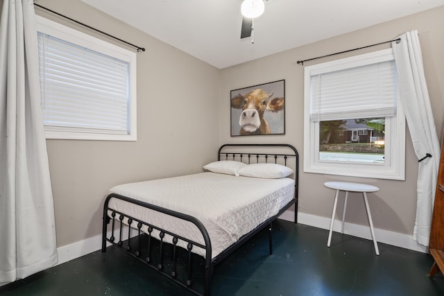 4619 Jenkins Ave Unit 1-4, North Charleston, SC 29405 - bedroom with baseboards, concrete floors, and a ceiling fan