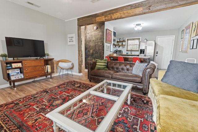 4619 Jenkins Ave Unit 1-4, North Charleston, SC 29405 - living area featuring wood finished floors and baseboards