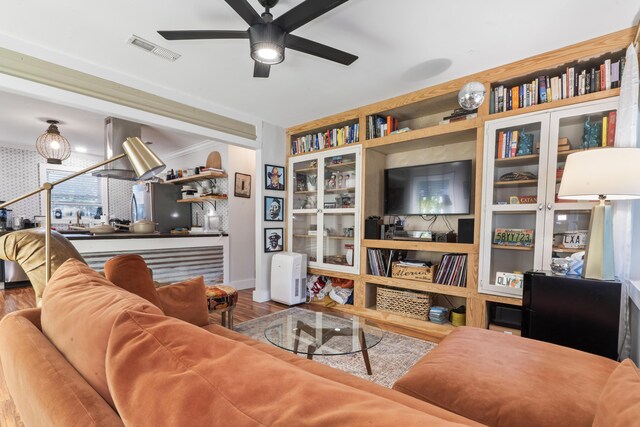 4619 Jenkins Ave Unit 1-4, North Charleston, SC 29405 - living room with wood finished floors, a ceiling fan, and built in features