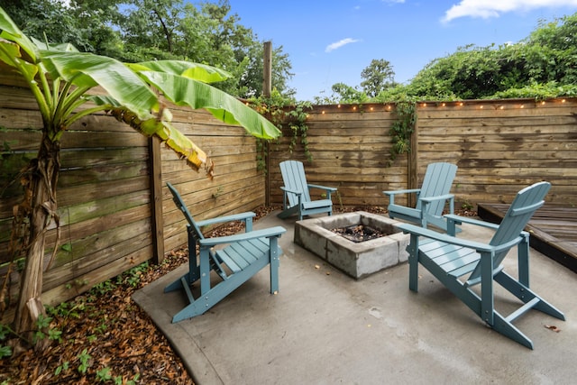 4619 Jenkins Ave Unit 1-4, North Charleston, SC 29405 - fenced backyard with a fire pit and a patio
