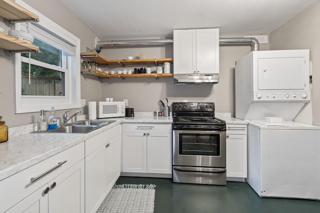 4619 Jenkins Ave Unit 1-4, North Charleston, SC 29405 - kitchen with stainless steel electric range, open shelves, a sink, white microwave, and stacked washer and clothes dryer