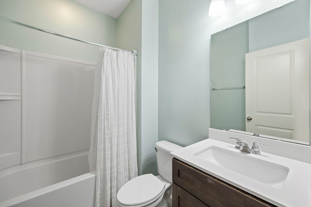 full bathroom featuring vanity, toilet, and shower / tub combo