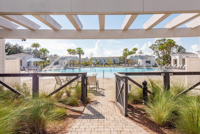 view of swimming pool featuring pool water feature