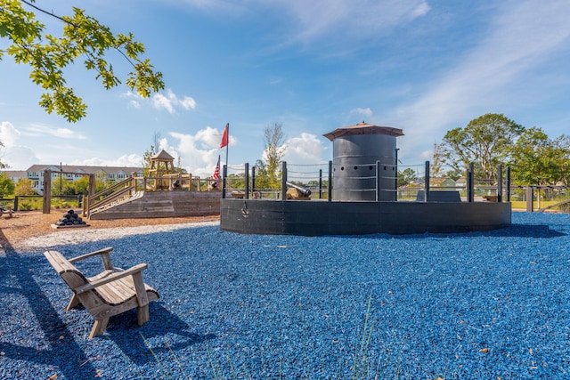 view of home's community with a playground