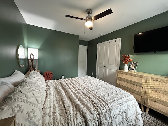 bedroom with a closet and a ceiling fan