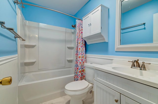 full bathroom featuring vanity, shower / bath combination with curtain, and toilet