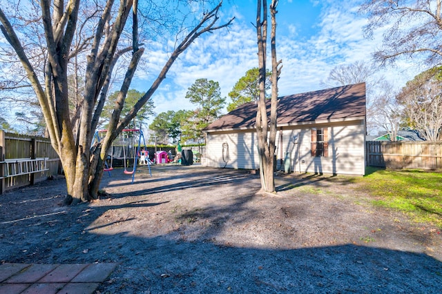 view of yard featuring a playground