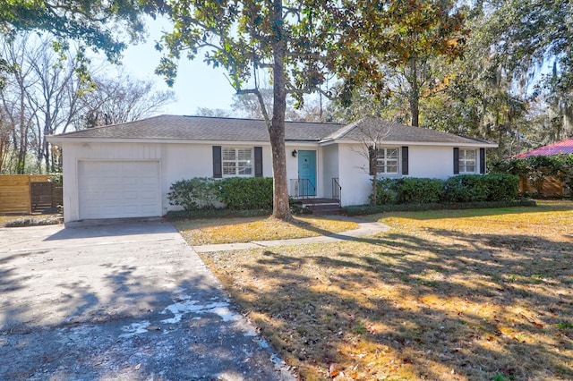 single story home with a garage