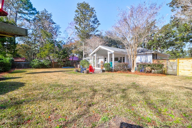 view of yard featuring a porch