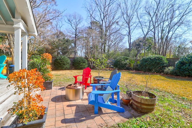 view of patio featuring a fire pit