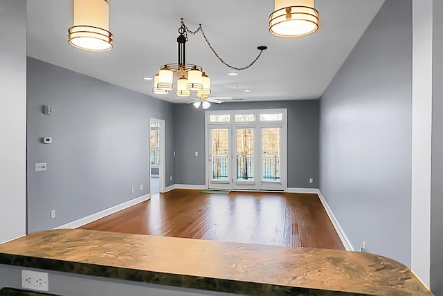 spare room featuring wood-type flooring