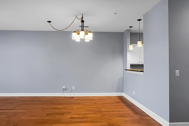 unfurnished room with light hardwood / wood-style flooring