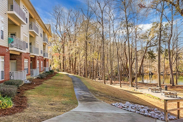 view of home's community featuring a water view