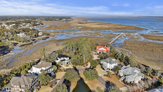 bird's eye view with a water view and a residential view