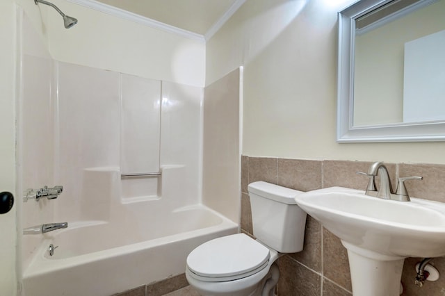 6275 Rolling Fork Rd Unit 401, North Charleston, SC 29406 - bathroom with crown molding, bathing tub / shower combination, a wainscoted wall, and tile walls