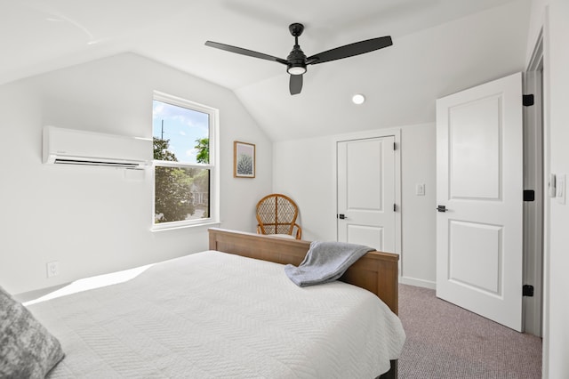 carpeted bedroom featuring a wall mounted air conditioner, ceiling fan, and lofted ceiling