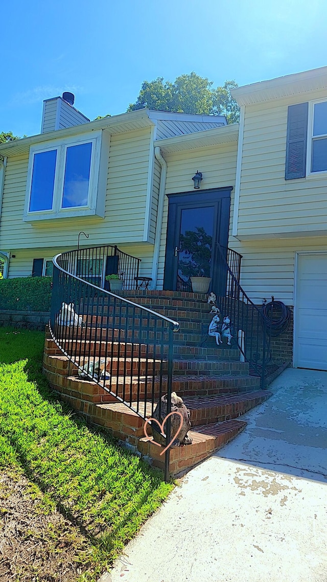 117 Valeworth Dr, Irmo, SC 29063 - view of front of home featuring an attached garage and a chimney