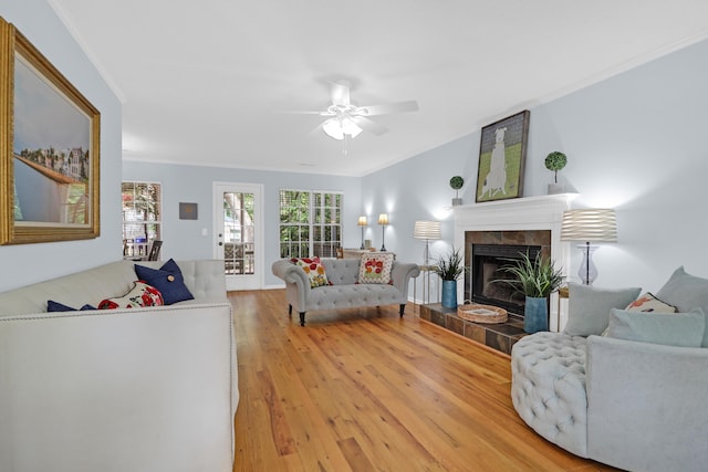 1394 Center Lake Dr, Mount Pleasant, SC 29464 - living area with crown molding, wood finished floors, ceiling fan, and a tile fireplace