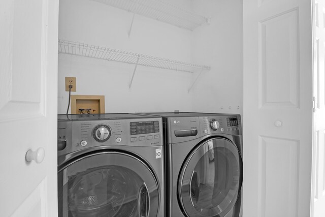 1394 Center Lake Dr, Mount Pleasant, SC 29464 - laundry area with washer and dryer