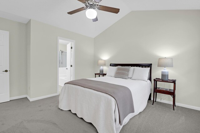 1394 Center Lake Dr, Mount Pleasant, SC 29464 - carpeted bedroom featuring lofted ceiling, baseboards, connected bathroom, and a ceiling fan