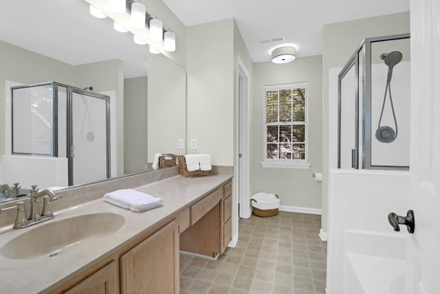 1394 Center Lake Dr, Mount Pleasant, SC 29464 - full bathroom with a shower stall, vanity, a garden tub, and baseboards