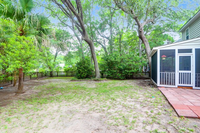 1394 Center Lake Dr, Mount Pleasant, SC 29464 - fenced backyard with a sunroom