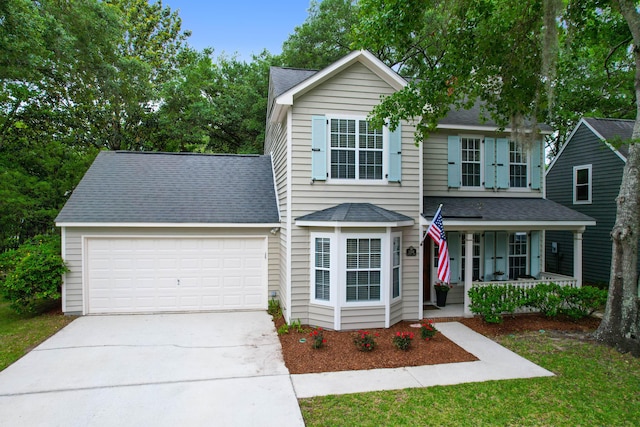 1394 Center Lake Dr, Mount Pleasant, SC 29464 - traditional home with a garage, covered porch, concrete driveway, and roof with shingles