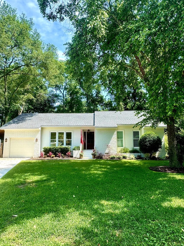 1015 Jacksnipe Ln, Mount Pleasant, SC 29464 - single story home with an attached garage, a front yard, and driveway