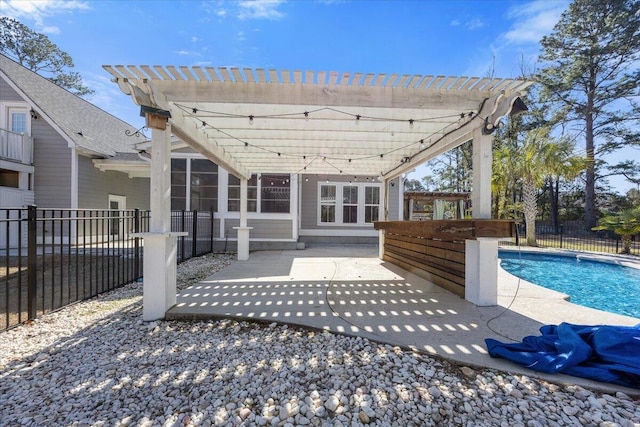 exterior space featuring a sunroom, fence, a fenced in pool, and a pergola