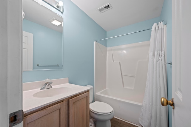 full bathroom featuring toilet, shower / tub combo, vanity, and hardwood / wood-style floors