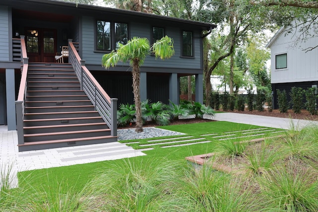 view of yard featuring stairway