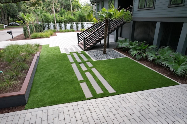 view of yard featuring stairs