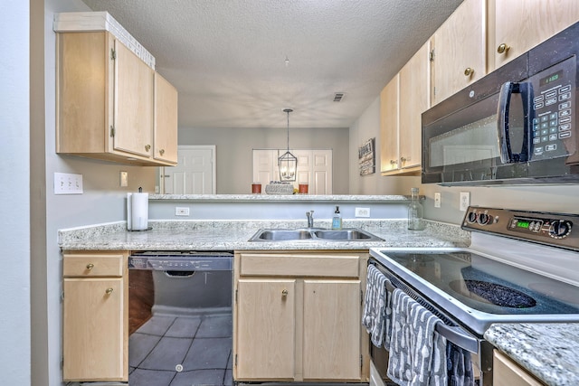 188 Midland Pkwy Unit 516, Summerville, SC 29485 - kitchen with black appliances, a sink, light brown cabinets, tile patterned floors, and a textured ceiling